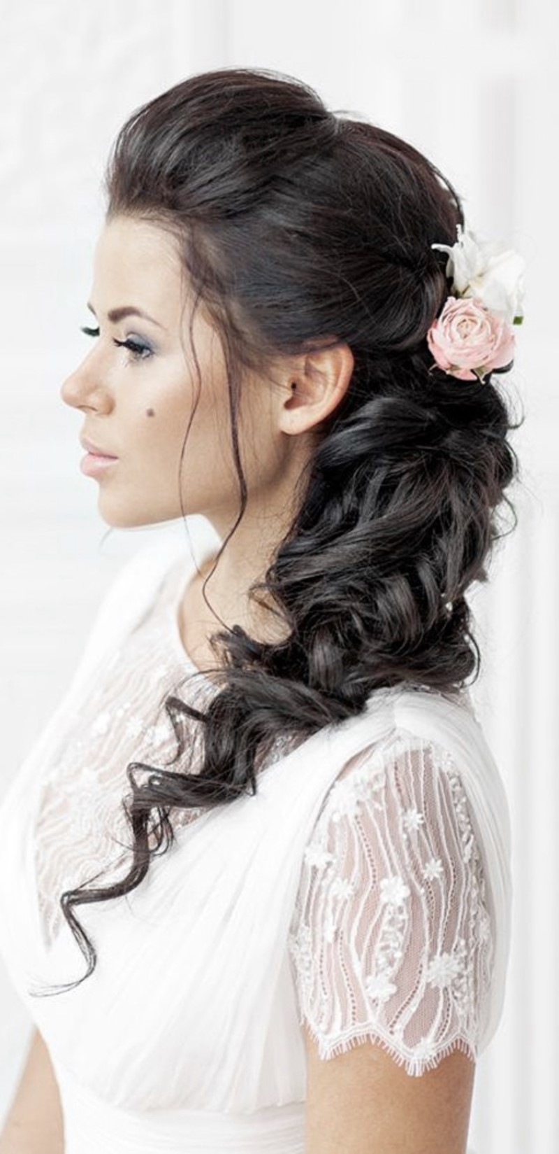 favorite-wedding-hairstyles-for-long-hair-fishtail-woth-flower-accessories-elstile-555555.jpg