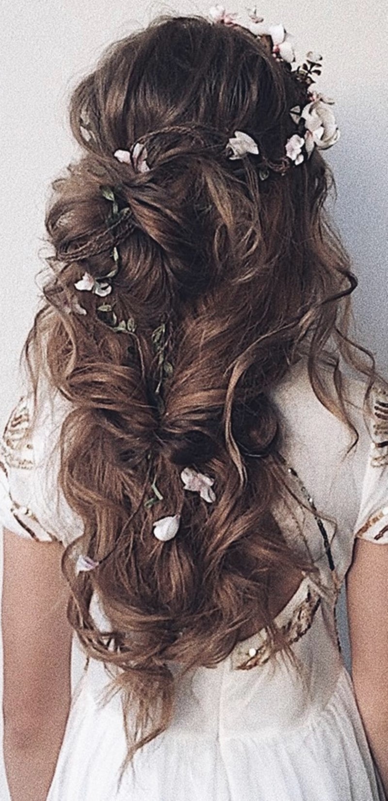 favorite-wedding-hairstyles-for-long-hair-romantic-hair-with-flowers-aster.jpg
